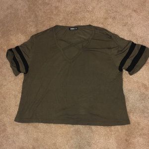 Green top with cross front